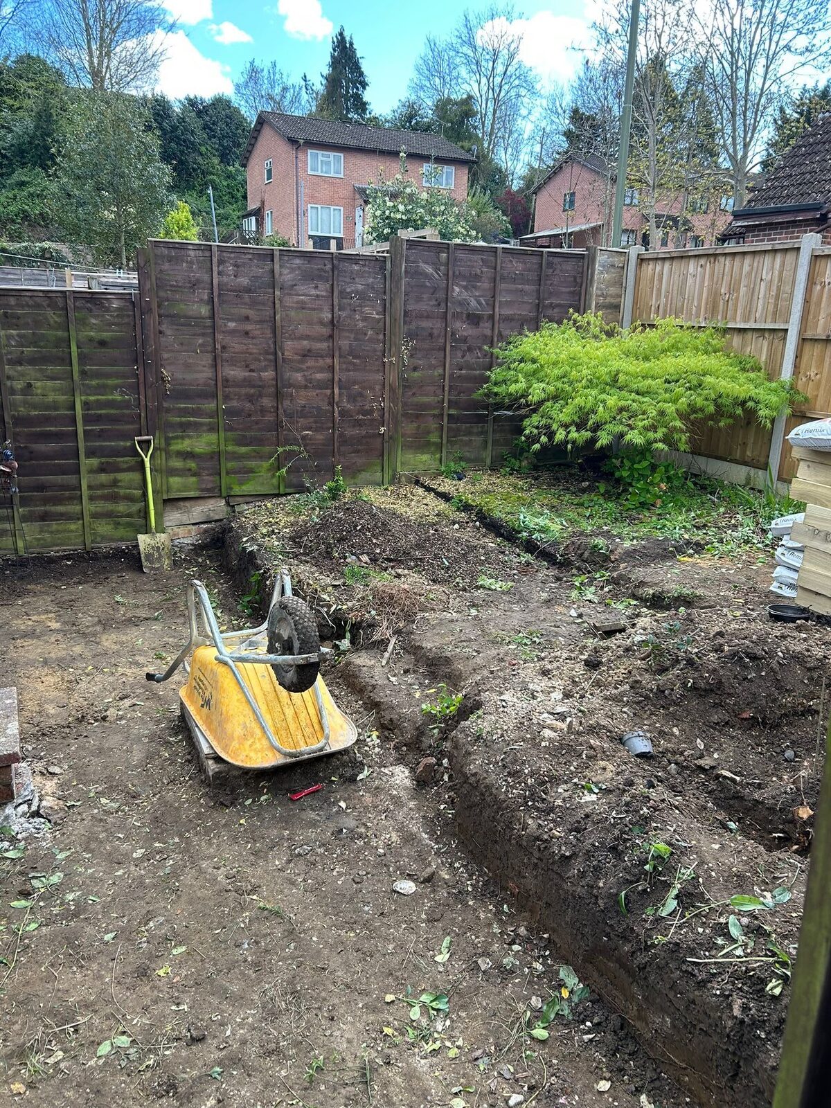 Garden stripped back to bare earth during groundworks